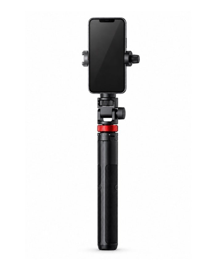 Phone tripod holding a phone